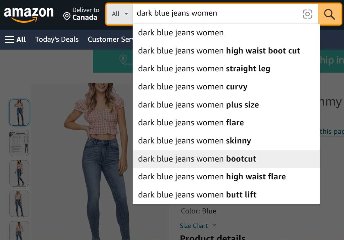 Amazon’s search bar with keyword suggestions on ‘dark blue jeans women’